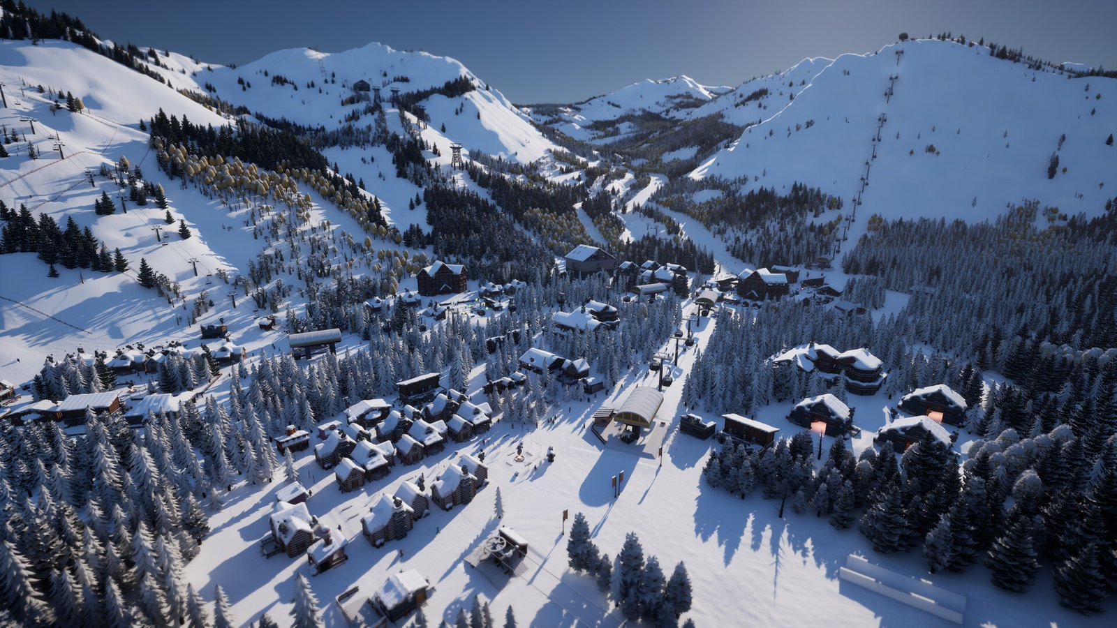 A ski village and lift network spread through a snowy mountain valley.