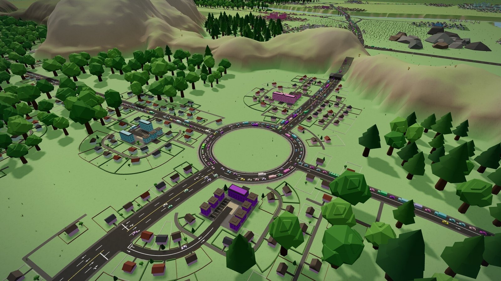 A large roundabout connects several roads in a growing neighbourhood.